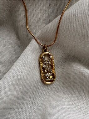 Yves Saint Laurent Gold and Pave YSL Monogram Pendant Necklace